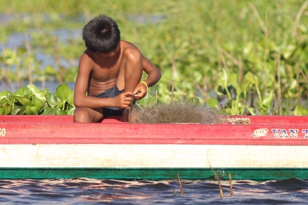 Fishing child. Tonle Sap, Cambodia. Kathy West Studios©2017